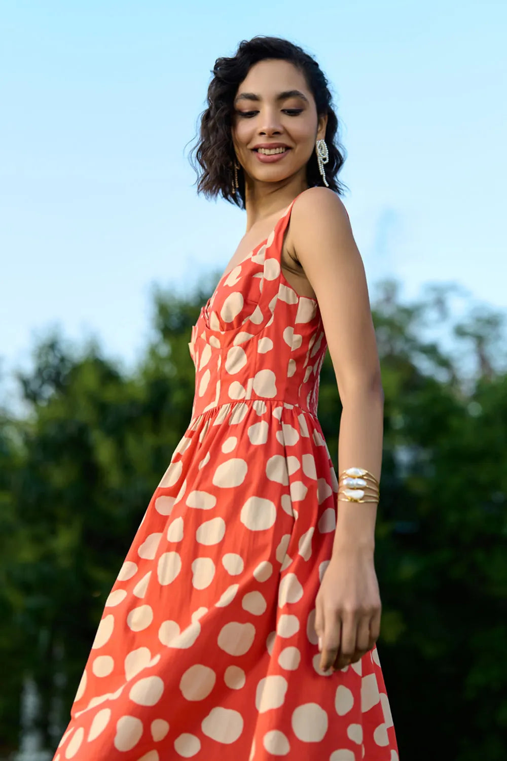 Caramine Dress Women's coral red cotton poplin dress with a feminine sweetheart neckline and flattering midi-length silhouette, styled for sunny summer days, brunches, casual outings and daytime gatherings. wearverb.com