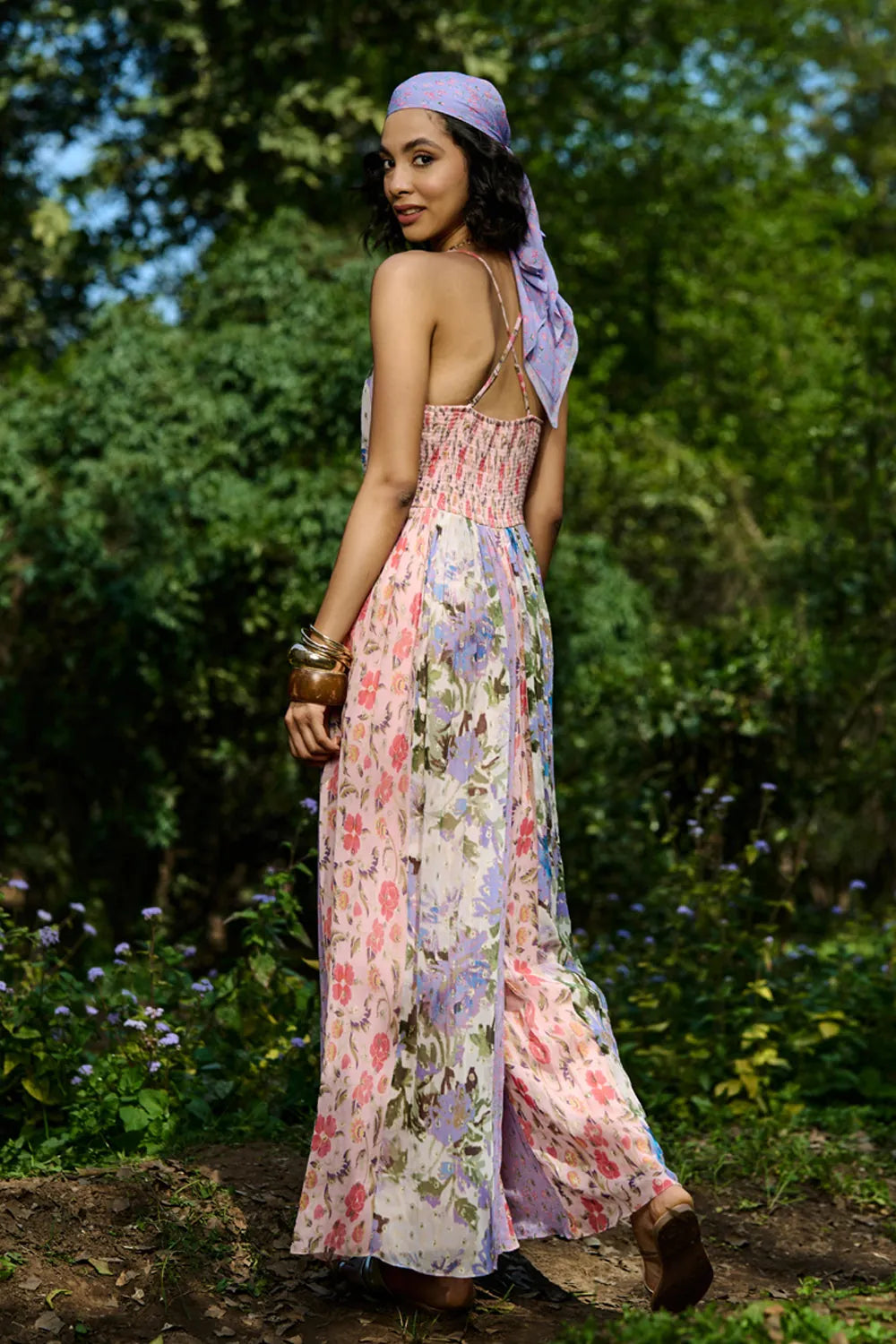 Back view of Carey Jumpsuit Women's multicolour Viscose Lurex Georgette jumpsuit featuring a romantic pink and mauve multi-printed jacquard design with a flattering flowing silhouette, styled for date nights, summer evenings, festive gatherings and day-to-night occasions.