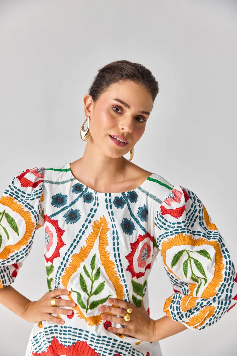Closeup look of Claire Embroidered Dress women's ivory cotton poplin shift dress featuring intricate embroidery, a straight relaxed silhouette and a clean contemporary finish, styled for summer brunches, festive daytime gatherings, coastal holidays and evening occasions.