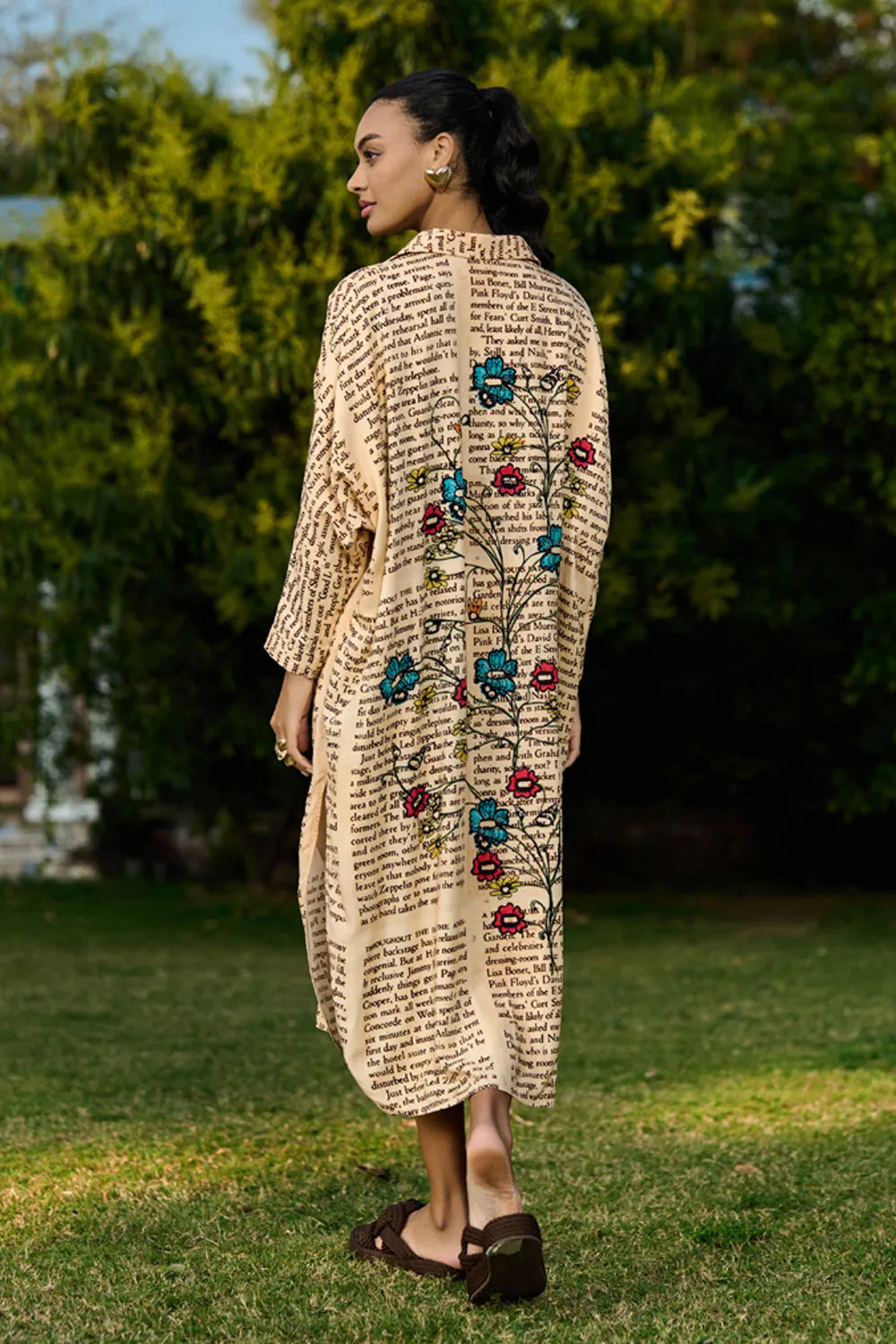 Dani Embroidered Shift Dress women's beige rayon midi dress featuring a vintage newspaper-inspired floral placement print, relaxed shift silhouette and timeless design, styled for summer brunches, vacation outings, creative daytime events and casual gatherings.