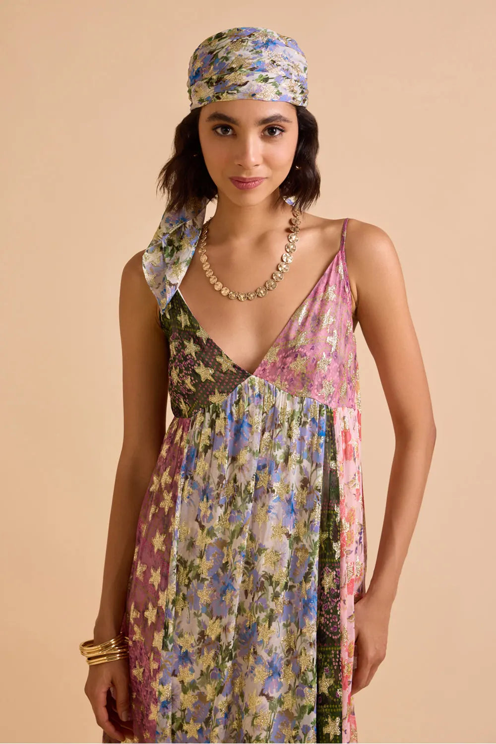 Closeup look of Irida Spaghetti Dress women's multicolour Viscose Lurex Georgette maxi dress featuring a jacquard printed colour-blocked design, delicate spaghetti straps and shimmering fabric with a flowing silhouette, styled for resort vacations, festive evenings, holiday getaways and special occasions.