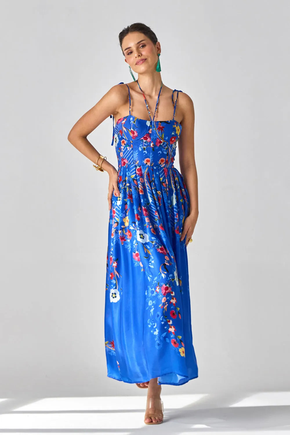 Full view of Isla Spaghetti Dress women's blue satin chiffon maxi dress featuring delicate spaghetti straps, a sleek flowing silhouette and minimal elegant styling, designed for resort evenings, intimate dinners, summer holidays and destination celebrations.