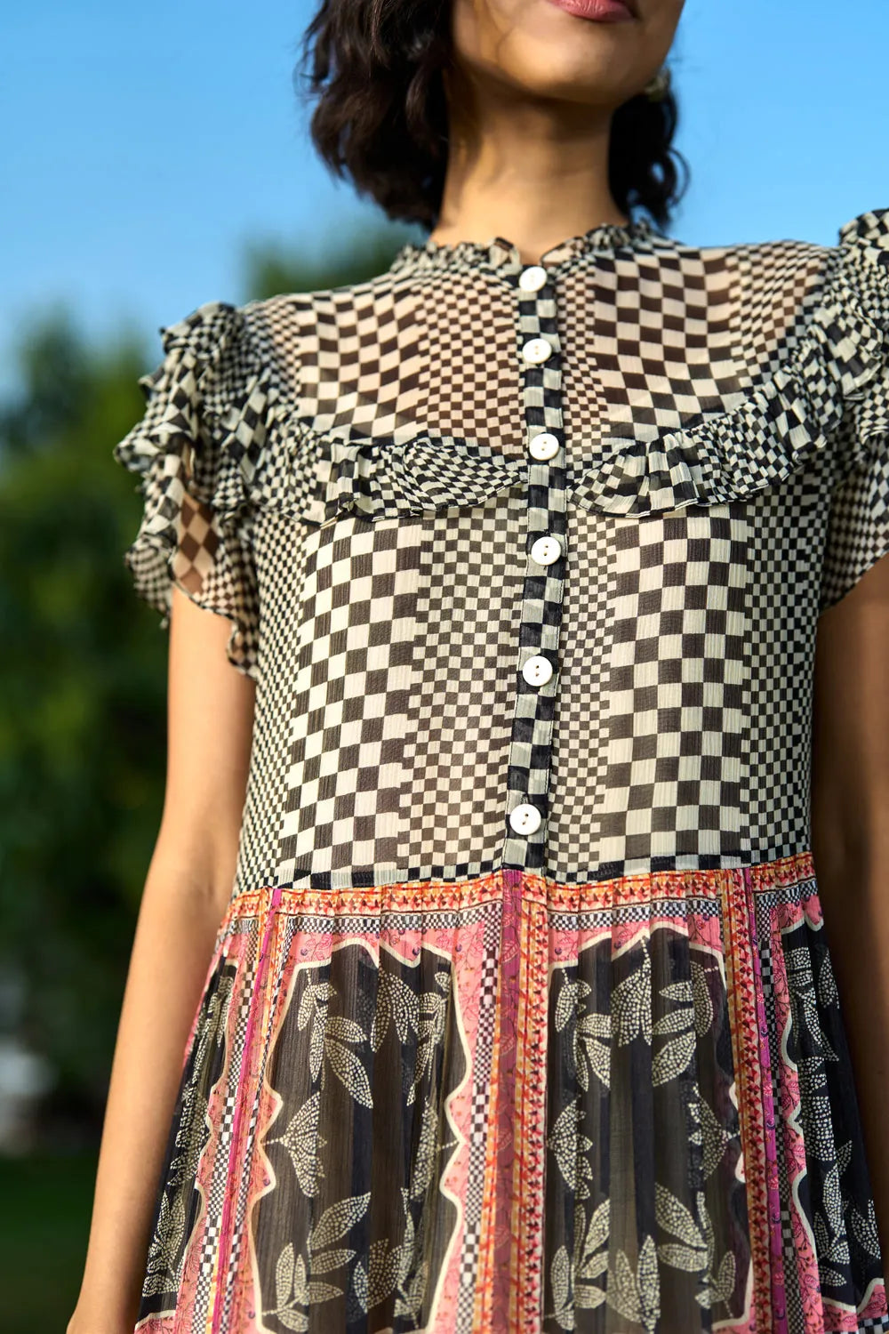 Closeup look of Lee Dress women's dress featuring a contemporary silhouette and distinctive design details, styled for summer outings, casual brunches, resort holidays and daytime gatherings.
