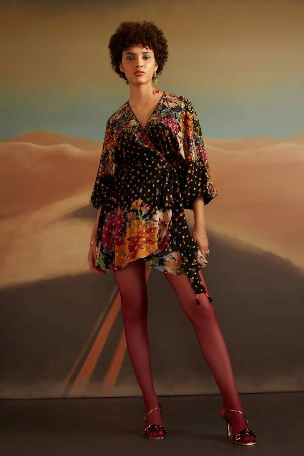 Marika Wrap Dress women's black Lurex viscose dress featuring sequenced embroidery, a shimmering printed georgette finish and a flattering wrap silhouette, styled for cocktail evenings, festive gatherings, dinner dates and special occasions.