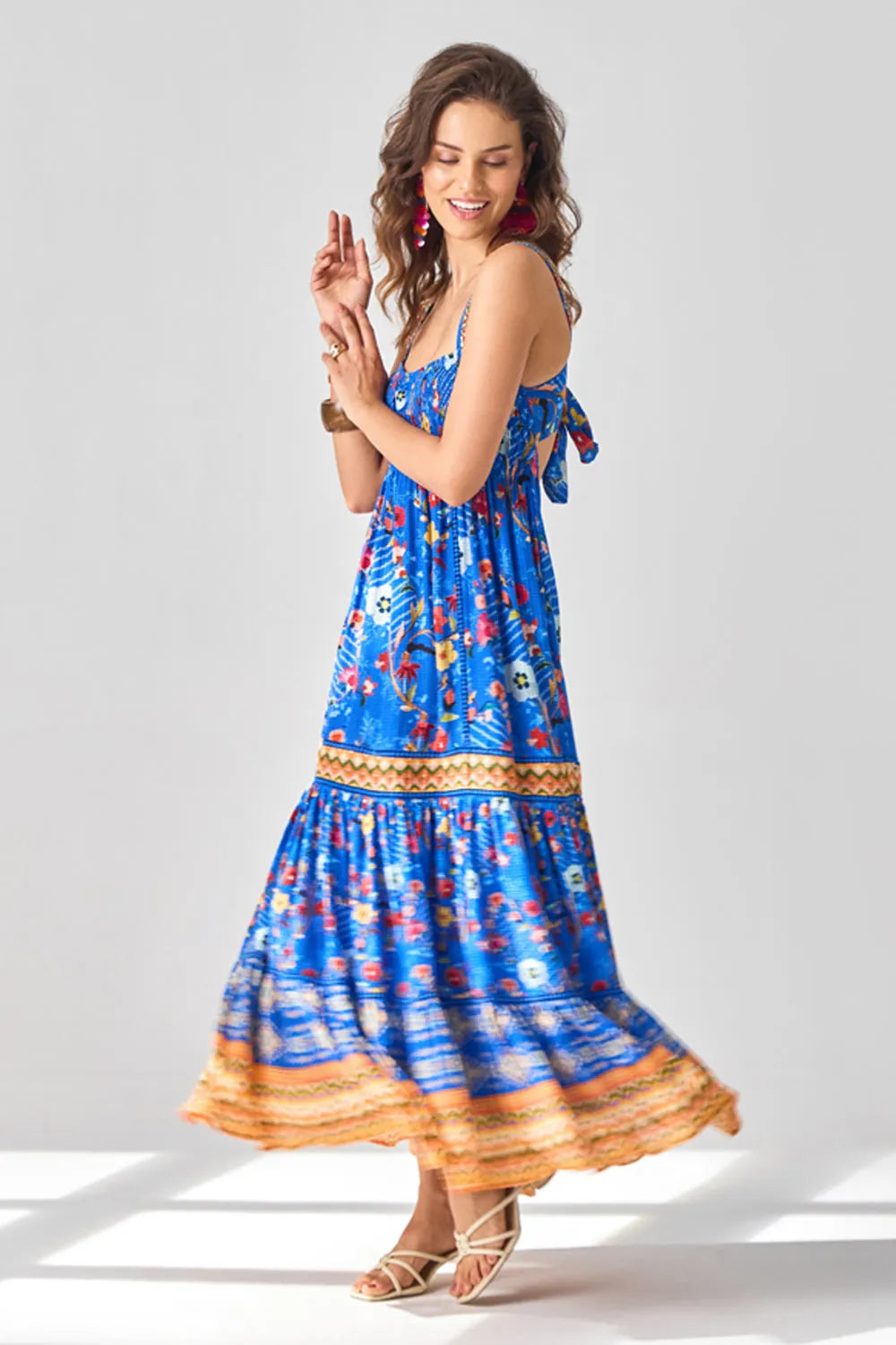 Mavis Maxi Dress women's maxi dress featuring a flowing silhouette and distinctive contemporary design, styled for summer holidays, resort vacations, brunches and special occasions.
