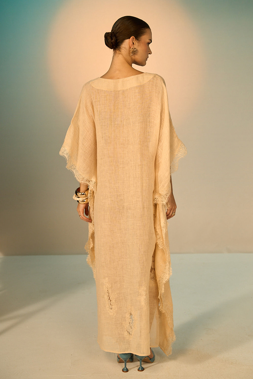 Back view of Miami Linen Coverup women's linen cover-up featuring a lightweight, breathable fabric and relaxed flowing silhouette, designed for layering over swimwear during beach holidays, resort vacations, poolside lounging and warm-weather getaways.
