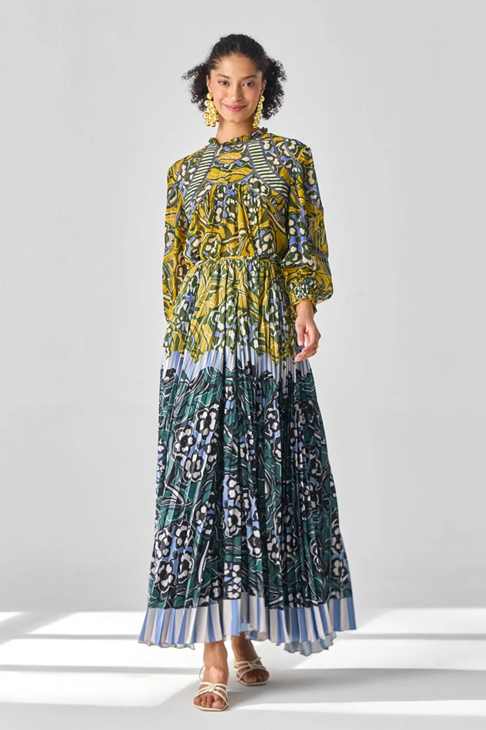 Nola Blouse women's statement blouse featuring a feminine silhouette and contemporary detailing, designed for effortless styling with skirts or trousers, suited for summer brunches, resort outings, holiday gatherings and casual occasions.