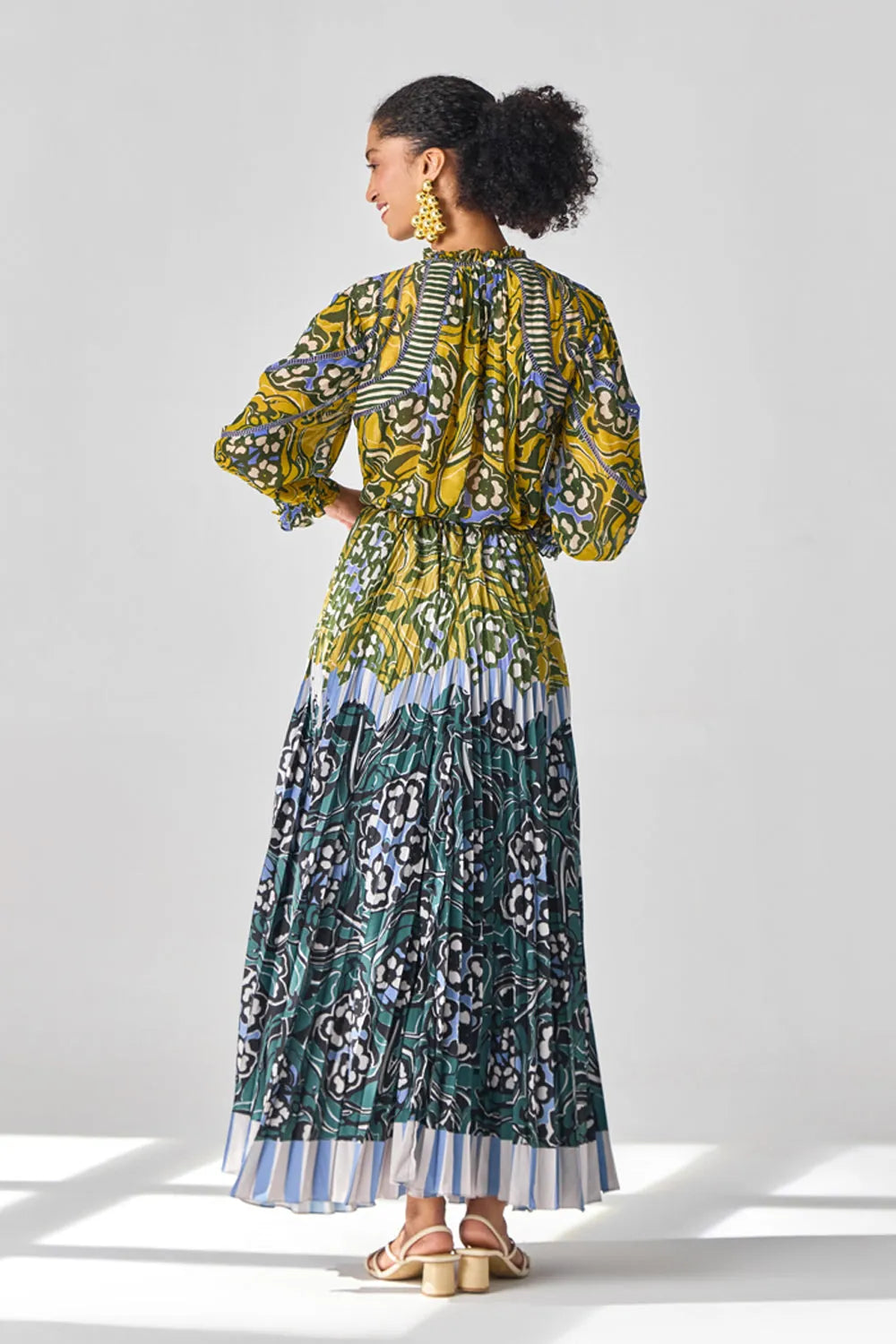 Back view of Nola Blouse & Skirt women's co-ord set featuring a coordinated blouse and matching skirt with a contemporary silhouette, styled for summer holidays, resort brunches, daytime celebrations and vacation outings.