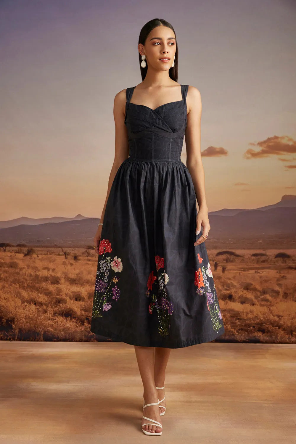 Orsa Dress women's statement dress featuring a contemporary silhouette and distinctive design details, styled for summer brunches, resort vacations, daytime outings and special occasions.