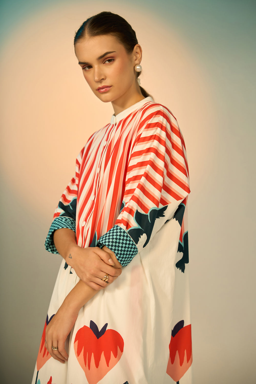 Peta Dress With Pants women's multicolour cotton poplin co-ord set featuring a bold graphic print dress paired with contrasting off-white stretch cotton trousers, combining playful patterns with a relaxed, easy-layering silhouette, styled for beach holidays, festivals, travel days and casual day-to-evening dressing.