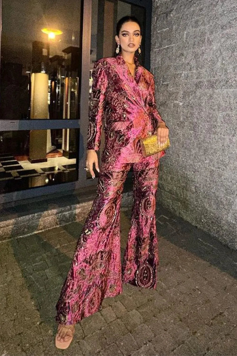 Pragnya Ayyagari wearing the Ramona Jacket & Pants Set, a women's ruby pink velvet co-ord featuring a structured jacket and matching tailored pants with intricate thread and sequin detailing, styled for cocktail parties, festive celebrations, winter events and glamorous evening occasions.