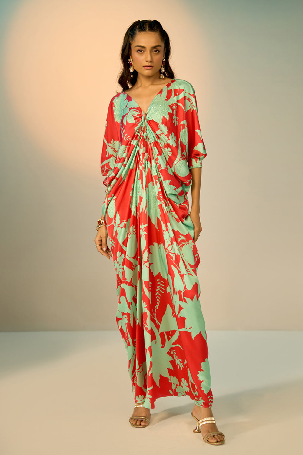 Red Lotus Kaftan women's kaftan featuring a flowing, relaxed silhouette and statement lotus-inspired design, styled for beach holidays, resort vacations, poolside lounging and elegant summer getaways.