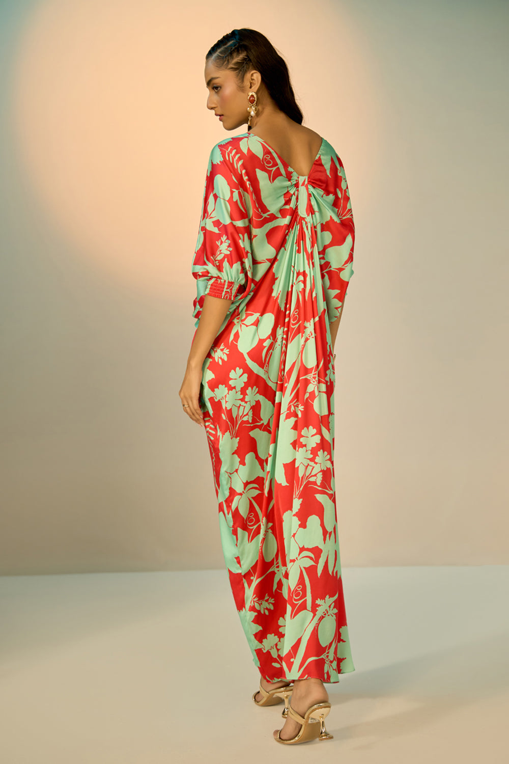 Back view of Red Lotus Kaftan women's kaftan featuring a flowing, relaxed silhouette and statement lotus-inspired design, styled for beach holidays, resort vacations, poolside lounging and elegant summer getaways.