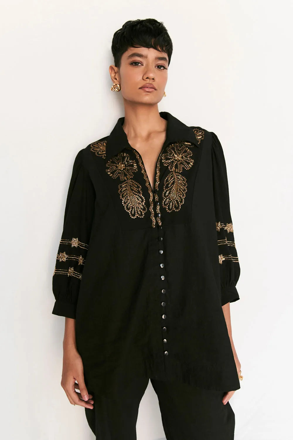 Rimi Shirt women's black cotton shirt featuring a relaxed silhouette, classic collared neckline, button-down front and clean contemporary styling, designed for comfortable everyday wear, styled for casual outings, travel days, brunches and smart-casual occasions.