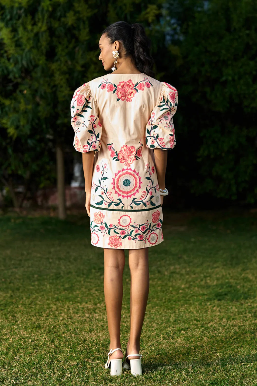 Back view of Saanvi Dress women's statement dress featuring a feminine silhouette and contemporary design details, styled for summer brunches, resort holidays, daytime gatherings and special occasions.