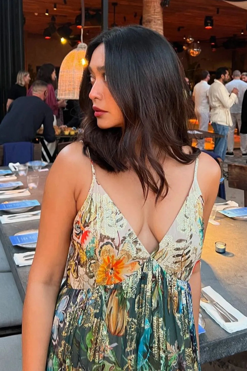 Sayani Gupta wearing the Katherine Maxi Dress, a women's multicolour viscose Lurex Georgette maxi dress featuring a vibrant jacquard print, delicate spaghetti straps and a subtle shimmering finish, styled for summer holidays, destination celebrations, festive evenings and resort occasions.