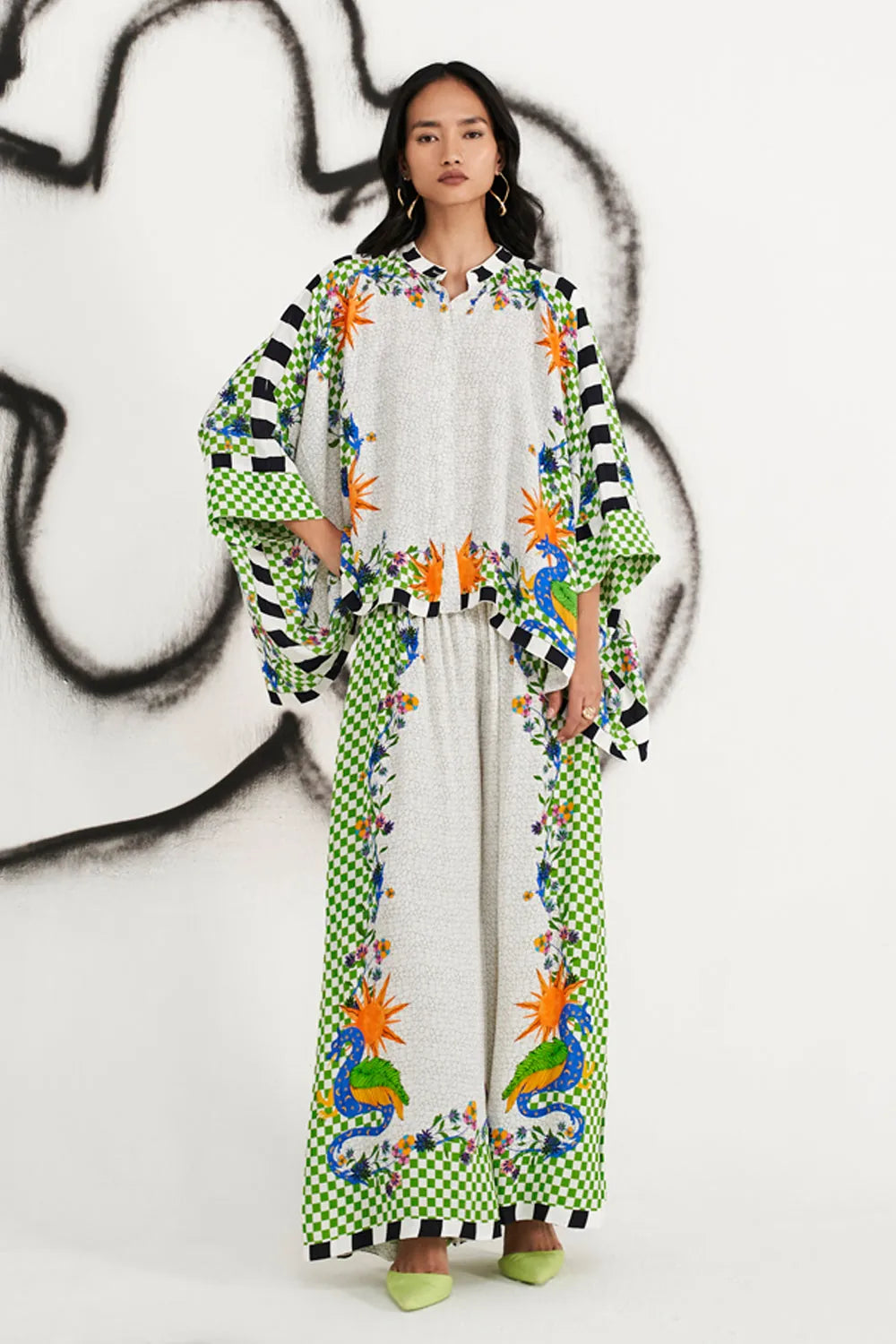 Shea Cape With Pants women's multicolour viscose georgette co-ord set featuring a flowing printed cape with dramatic sleeves and matching relaxed wide-leg pants, combining an artistic multicolour print with fluid movement, styled for festive celebrations, resort evenings, destination gatherings and special occasions.