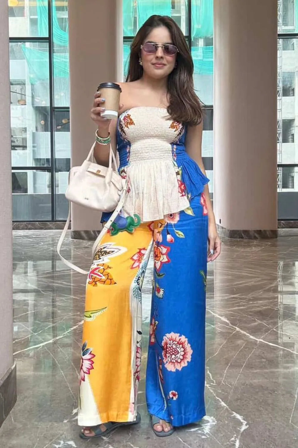 Simran Luthria wearing the Rey Blouse With Tiana Pants, a women's coordinated outfit featuring a statement blouse paired with matching Tiana pants, combining contemporary styling with a coordinated silhouette, suited for summer outings, resort vacations, brunches and casual celebrations.