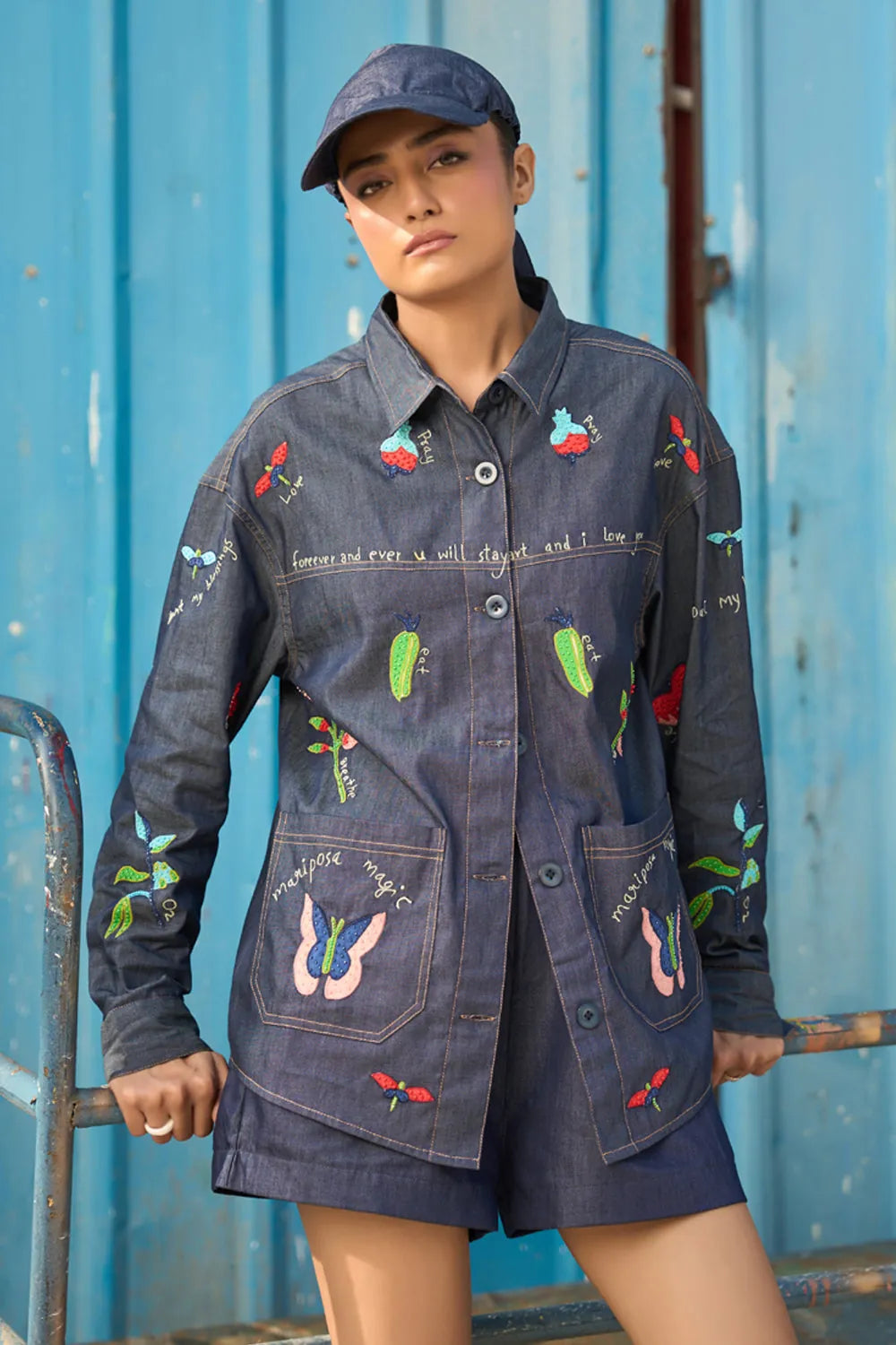 A woman wearing Soha Shirt & Pants Set, a women's coordinated outfit featuring a statement shirt and matching pants with a relaxed, contemporary silhouette, styled for summer outings, resort vacations, brunches and elevated casual occasions.