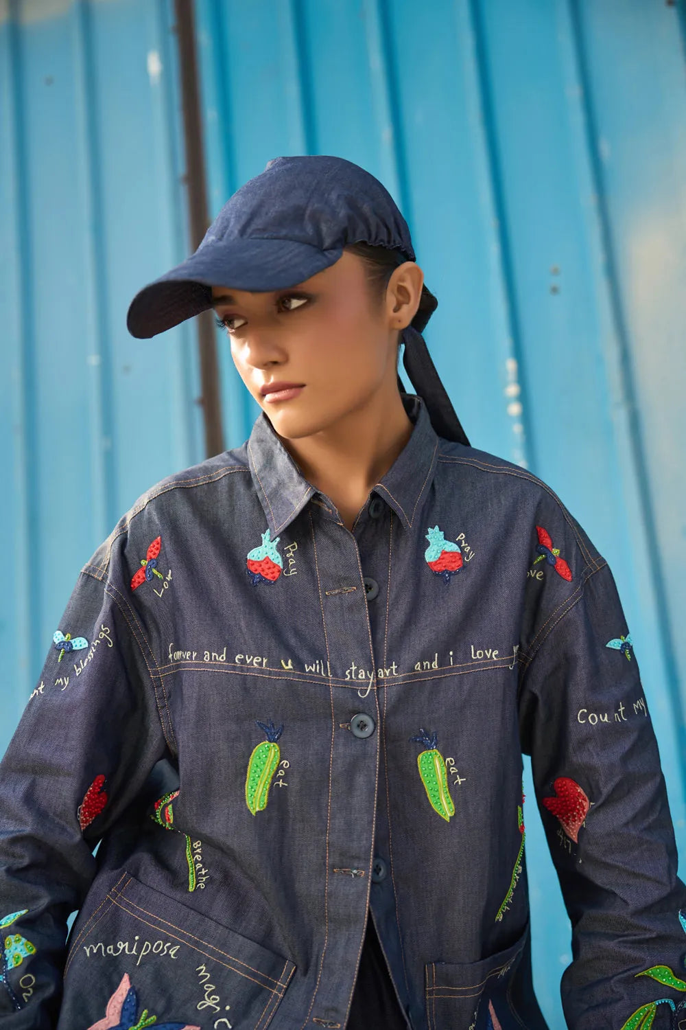 A woman wearing Soha Shirt, a women's coordinated outfit featuring a statement shirt with a relaxed, contemporary silhouette, styled for summer outings, resort vacations, brunches and elevated casual occasions.