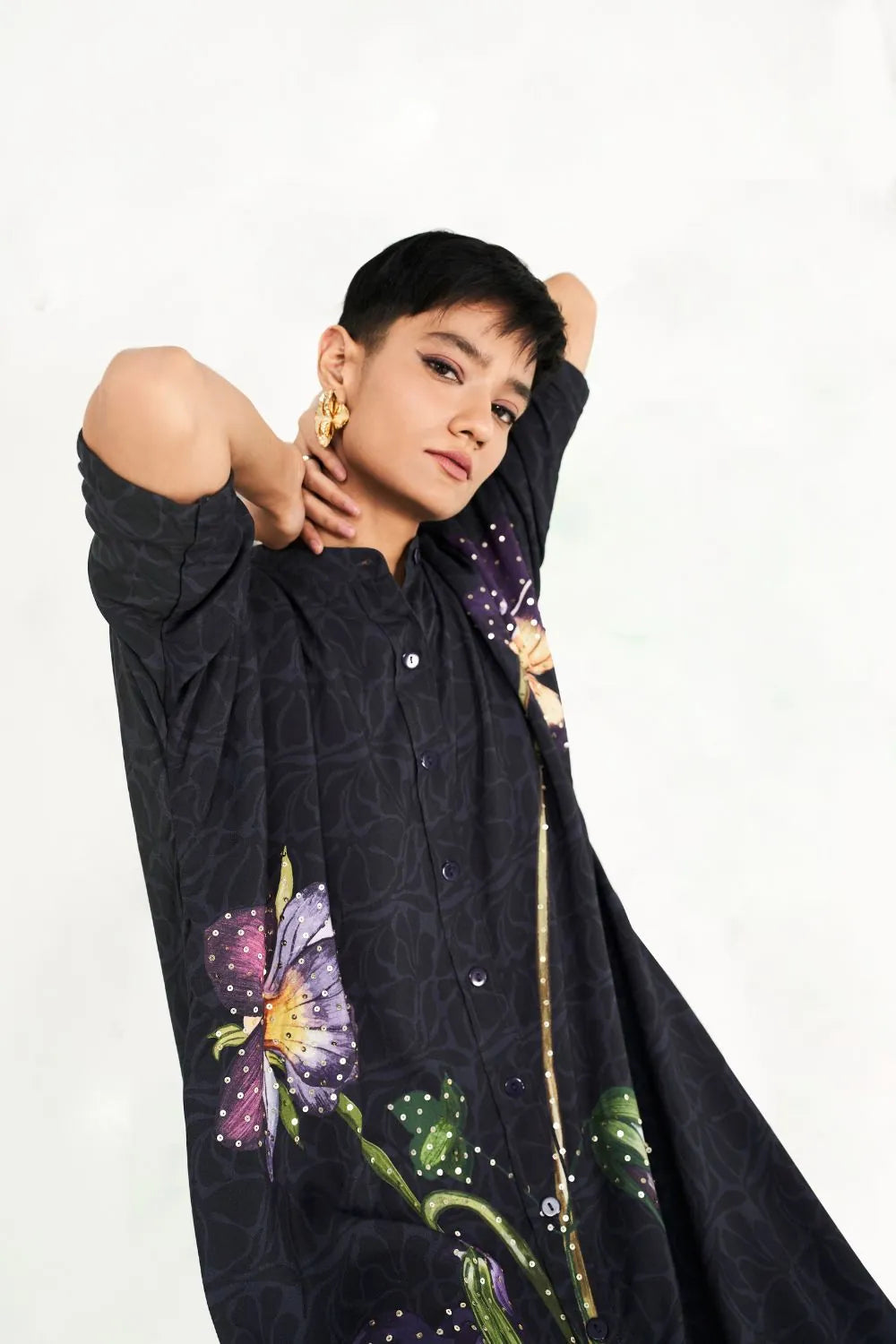 Closeup view of Tushita Dress women's statement dress featuring a feminine silhouette and distinctive contemporary detailing, styled for summer celebrations, resort vacations, brunches and special occasions.