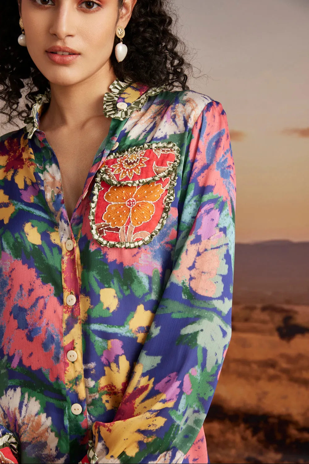Closeup look of Arisha Blouse, multicolour Vicose Crepe cloth with contemporary silhouette, designed for versatile occasion dressing for woman.