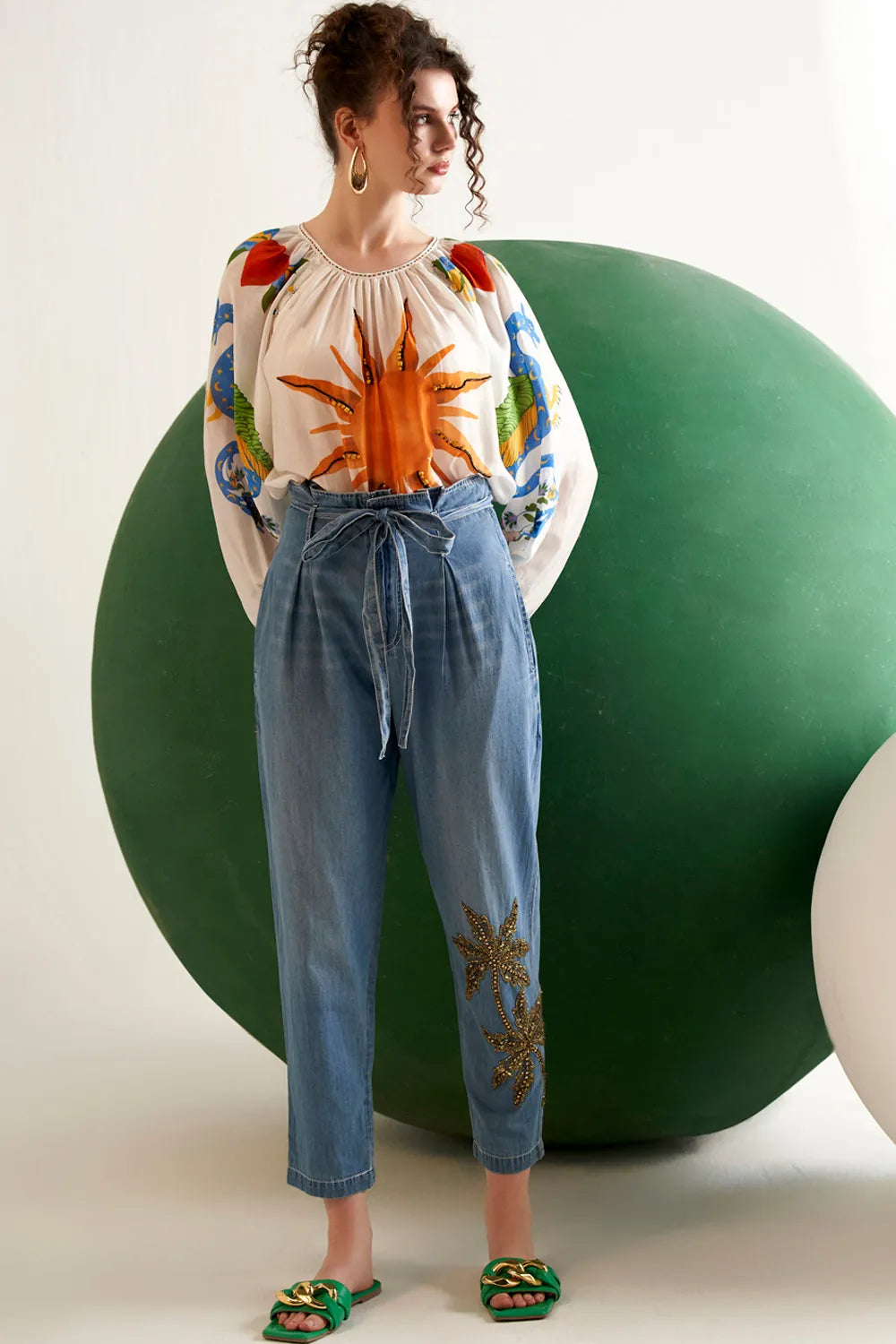 Aarvi Pant in Ivory sun printed stone detailing styled for women's resort wear and casual outings.
