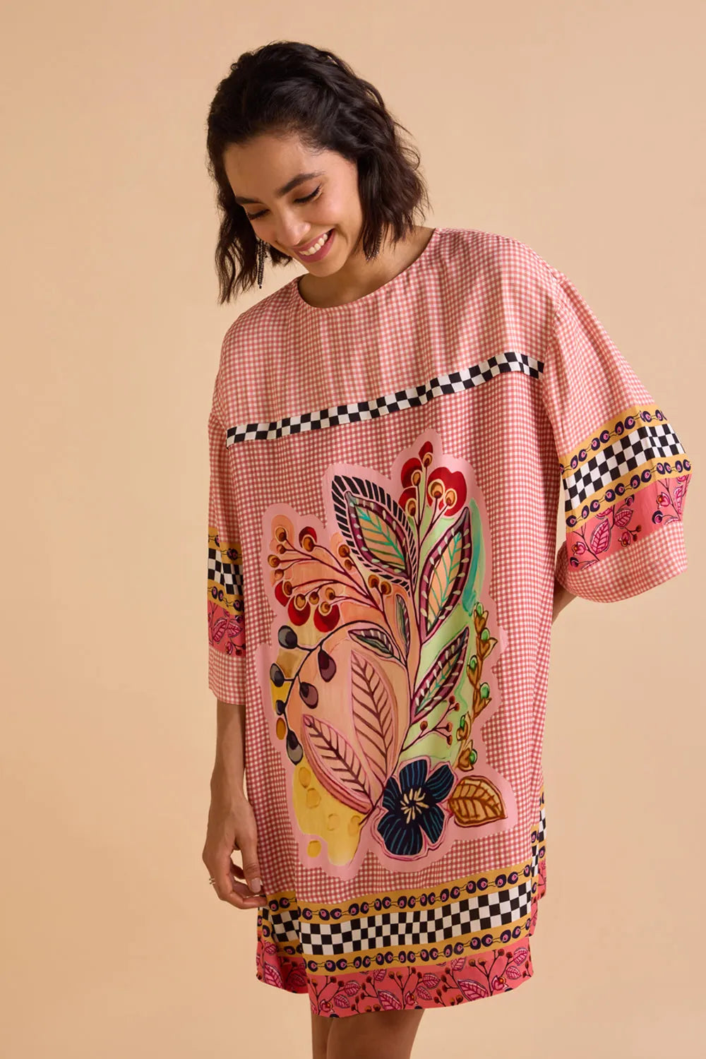 Zion Dress women's statement dress featuring a contemporary silhouette and distinctive design details, styled for summer outings, resort vacations, brunches and special occasions.
