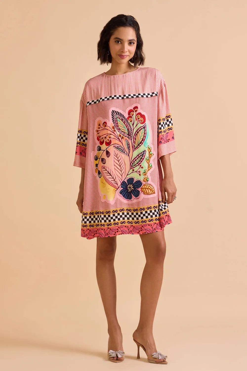 Zion Dress women's statement dress featuring a contemporary silhouette and distinctive design details, styled for summer outings, resort vacations, brunches and special occasions.