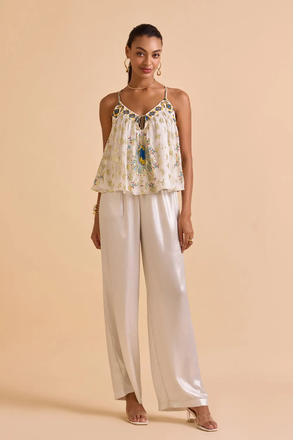 Zita Beaded Blouse With Pants women's coordinated outfit featuring a statement beaded blouse paired with matching pants, combining decorative craftsmanship with a polished silhouette, styled for festive celebrations, evening gatherings, resort dinners and special occasions.