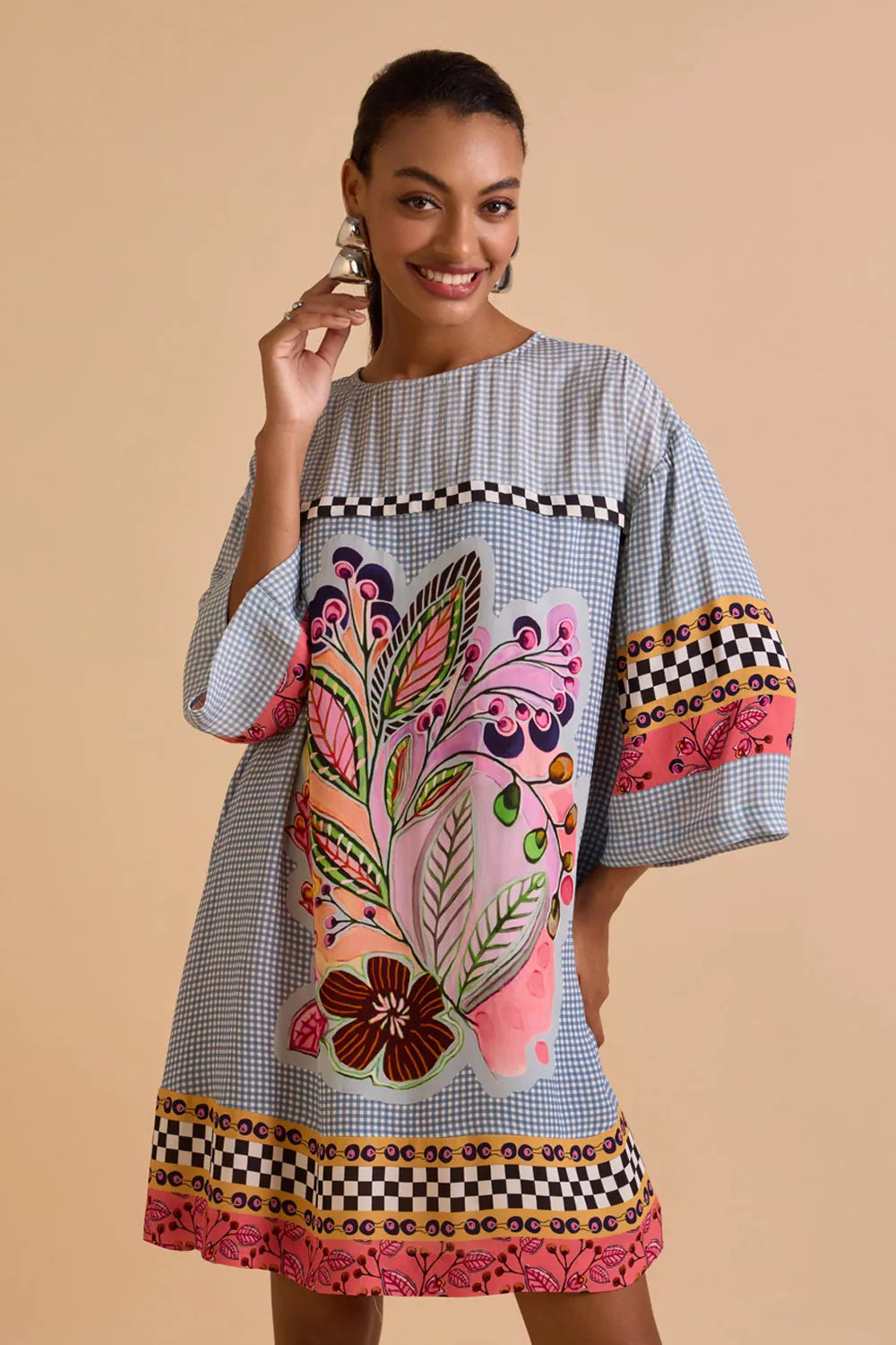 Ziva Dress women's statement dress featuring an elegant silhouette and contemporary detailing, styled for summer brunches, resort vacations, daytime celebrations and special occasions.