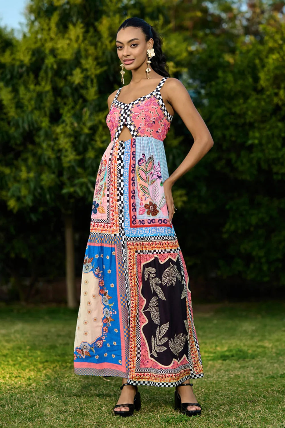 Aarna Beaded Spaghetti Women's pink printed sleeveless maxi dress with checkerboard trim and vibrant bohemian pattern, styled for resort vacations, summer holidays and brunch outings.