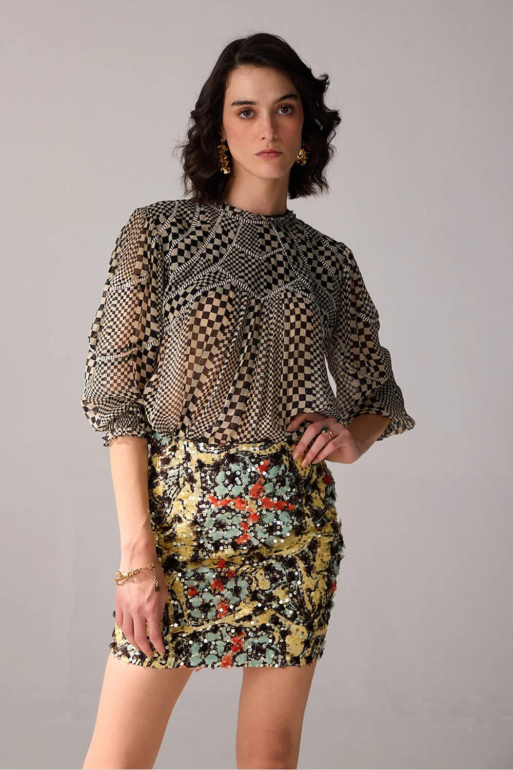 Aria floral mini skirt featuring a multicolour botanical print, fitted mini silhouette and intricate embellishment details