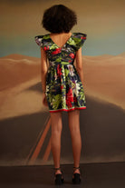 Back view of Alizey Mini Dress in Black cotton satin featuring silhouette with luxe fabric perfect for parties, events, and standout evening looks foe woman.