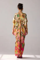 Back view of Amiya Kaftan Dress in pink ombre, with vibrant prints and silhouette made of bemberg satin perfect for vacations, resort wear, and relaxed elegance for woman.