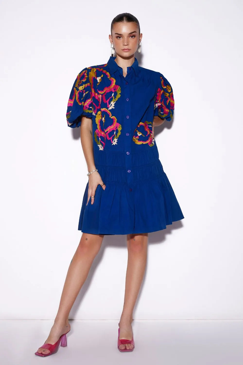 Carina Dress women's cobalt blue cotton mini dress with a graceful feminine silhouette, refined detailing and a polished contemporary finish, styled for summer brunches, festive daytime gatherings, casual celebrations and elevated occasions.