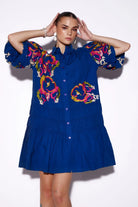 Carina Dress women's cobalt blue cotton mini dress with a graceful feminine silhouette, refined detailing and a polished contemporary finish, styled for summer brunches, festive daytime gatherings, casual celebrations and elevated occasions.