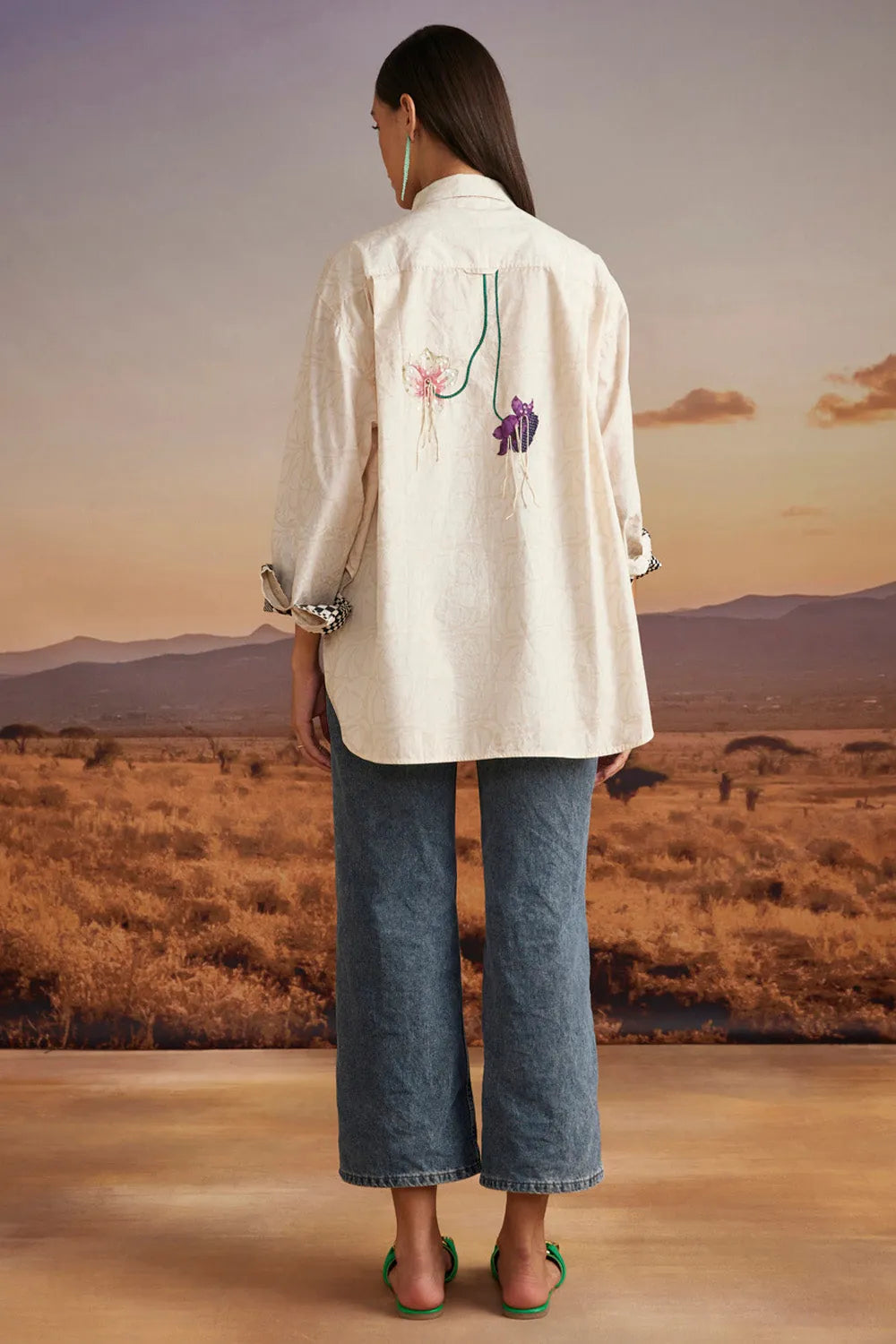 Back view of Chiara Shirt women's beige cotton poplin shirt with a relaxed free-size silhouette and intricate thread and bead detailing, styled for summer outings, brunches, festive daytime gatherings and elevated casual occasions.