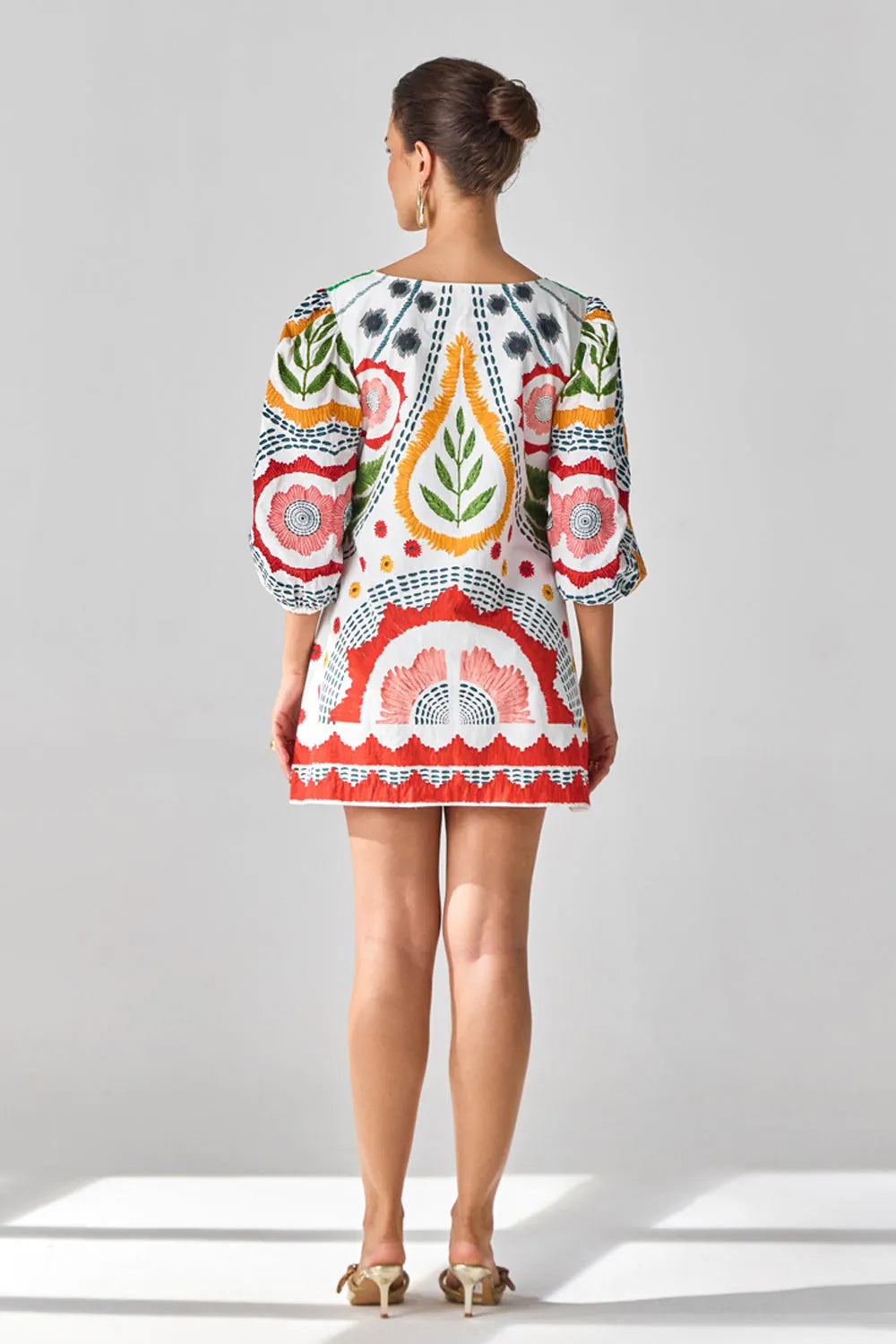 Back view of Claire Embroidered Dress women's ivory cotton poplin shift dress featuring intricate embroidery, a straight relaxed silhouette and a clean contemporary finish, styled for summer brunches, festive daytime gatherings, coastal holidays and evening occasions.