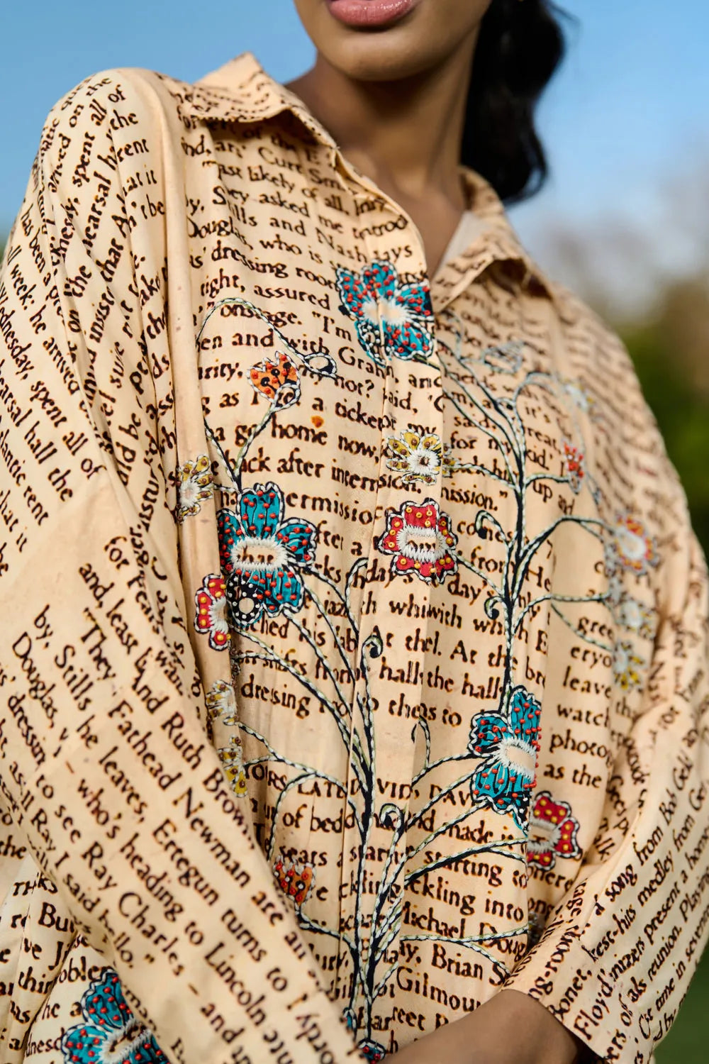 Dani Embroidered Shift Dress women's beige rayon midi dress featuring a vintage newspaper-inspired floral placement print, relaxed shift silhouette and timeless design, styled for summer brunches, vacation outings, creative daytime events and casual gatherings.