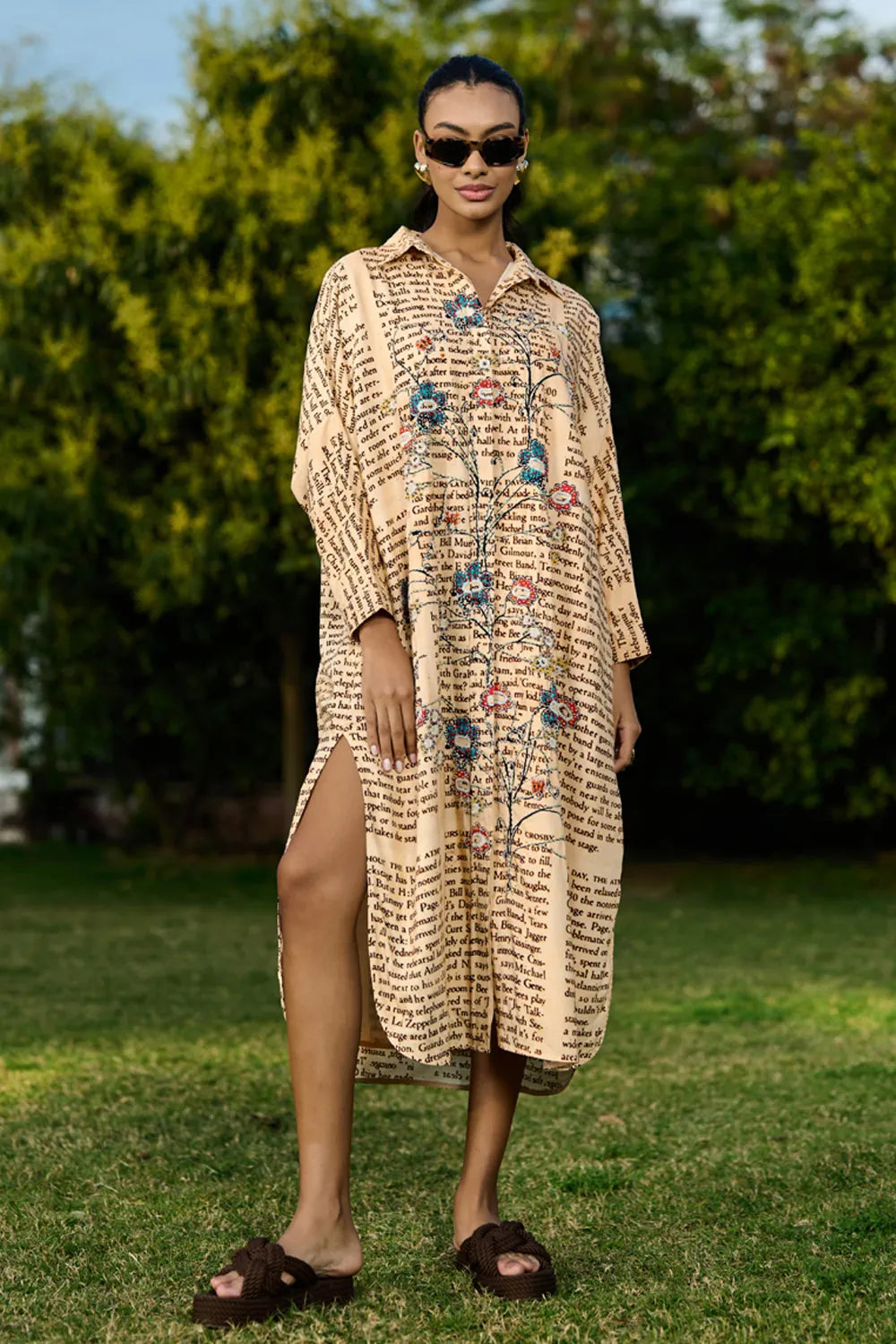 Dani Embroidered Shift Dress women's beige rayon midi dress featuring a vintage newspaper-inspired floral placement print, relaxed shift silhouette and timeless design, styled for summer brunches, vacation outings, creative daytime events and casual gatherings.