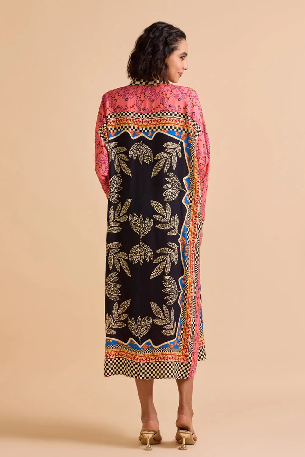 Back view of Denver Dress women's dress featuring a contemporary silhouette and distinctive design details, styled for summer outings, resort vacations, brunches and daytime gatherings.
