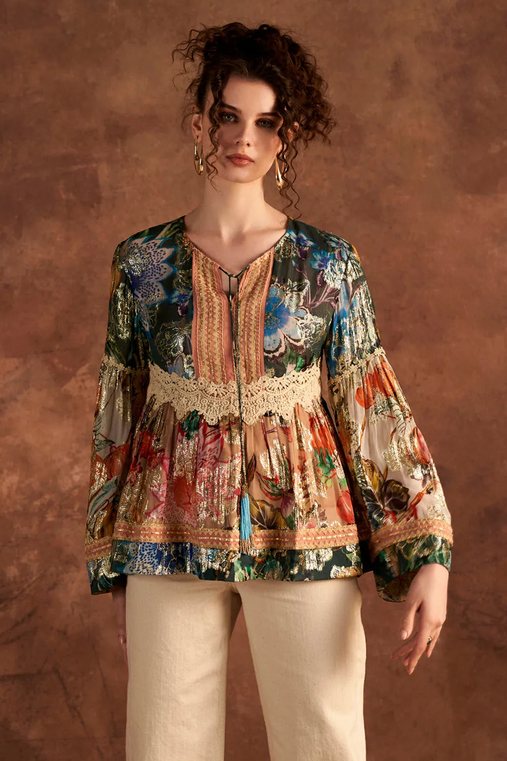 Ellie Blouse women's statement blouse featuring a contemporary silhouette and distinctive detailing, designed to elevate everyday outfits, styled for brunches, resort outings, evening gatherings and occasion wear.
