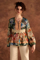 Ellie Blouse women's statement blouse featuring a contemporary silhouette and distinctive detailing, designed to elevate everyday outfits, styled for brunches, resort outings, evening gatherings and occasion wear.