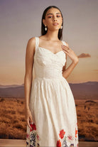 Emery Dress women's beige cotton dress featuring a sweetheart neckline, delicate bead detailing and a floral print with a feminine 50-inch silhouette, styled for summer brunches, resort vacations, garden parties and special occasions.