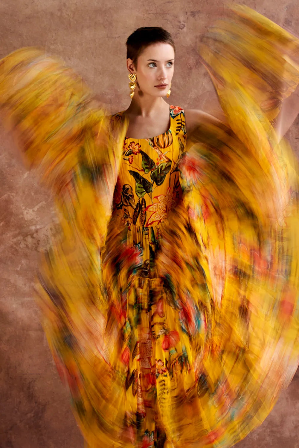Eona Dress women's yellow organza midi dress featuring a vibrant multicolour print, romantic tiered skirt and airy flowing silhouette, styled for summer brunches, garden parties, resort holidays and festive daytime celebrations.