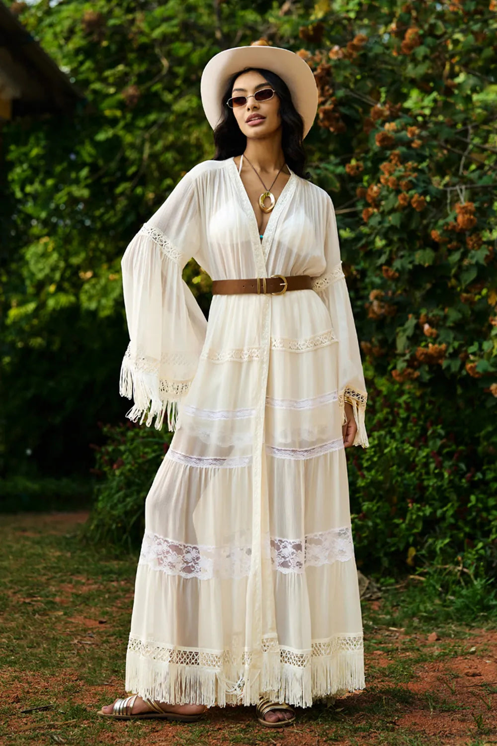 Femi Cape with Shorts women's ivory chiffon co-ord set featuring a flowing long cape with delicate all-over lace detailing and matching shorts with lace accents, styled for beach holidays, resort vacations, poolside gatherings and elegant summer getaways.