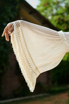 Femi Cape with Shorts women's ivory chiffon co-ord set featuring a flowing long cape with delicate all-over lace detailing and matching shorts with lace accents, styled for beach holidays, resort vacations, poolside gatherings and elegant summer getaways.