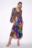 Flavia Kaftan women's kaftan featuring a relaxed, flowing silhouette and statement resortwear design, styled for beach holidays, tropical getaways, poolside lounging and elegant summer occasions.