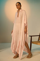 Ibiza Linen Coverup women's pink linen cover-up featuring intricate zari paisley embroidery along the neckline and sleeves, an open-front flowing silhouette and a separate detachable slip, designed for layering over swimwear during beach holidays, resort vacations and elegant summer getaways.